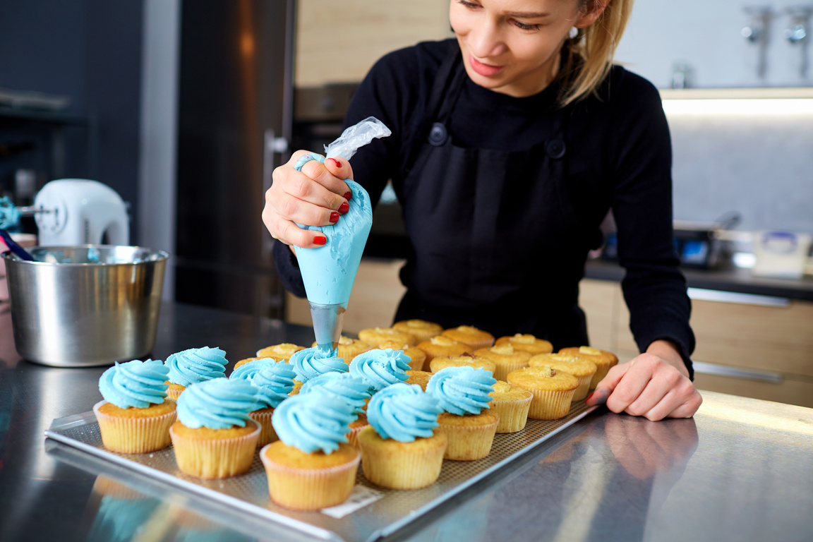 Pastry Chef with Cupcakes 